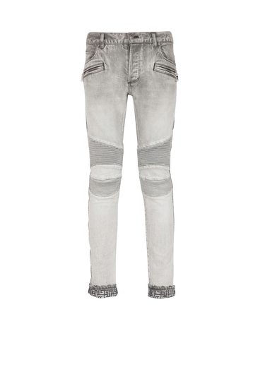 Slim cut faded and ridged light gray cotton jeans with Balmain monogram on hem